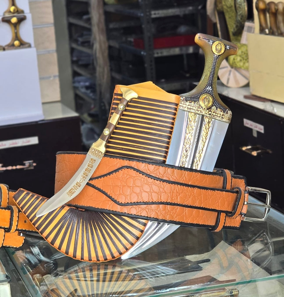 جمبية عزيري صيفاني مقلد طبق الاصل عسيب بكيلي حزام جلد أفريقي اصلي حروف مطلي ذهب مبسم فضه نصله ستيل مع شفره نجراني